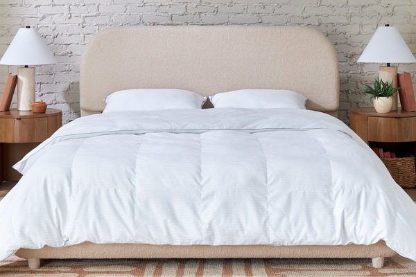 indulgence-bedroom bed with pillows and comforter