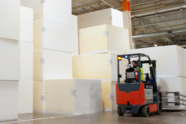 employee driving a forklift